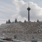 لندسکیپ برج میلاد در یک روز برفی