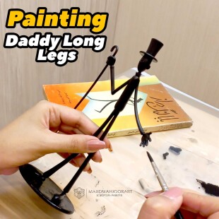 رنگ آمیزی مجسمه نوستالژیک بابا لنگ دراز